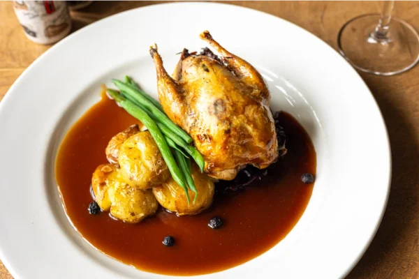 Local sourced produce pub lunch and dinner food at Brace of pheasants Inn Dorset UK