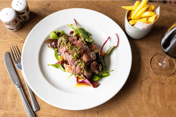 Local sourced produce pub lunch and dinner food at Brace of pheasants Inn Dorset UK